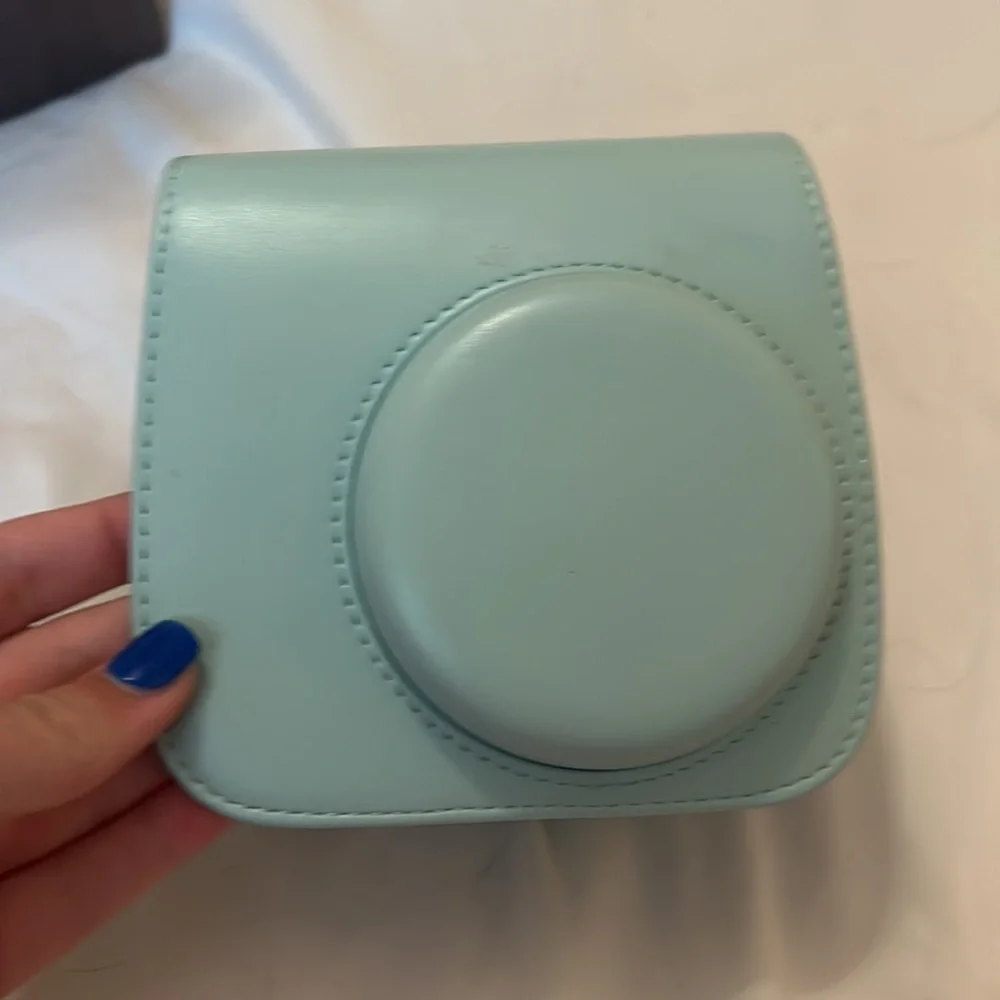 Polaroid blue camera
